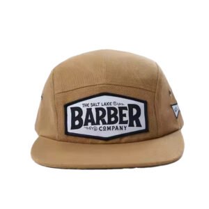 A brown 5 - panel hat made of pure cotton with an embroidered logo on the front, adult size, suitable for outdoor camping. Ideal for wholesale.