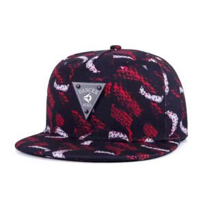 Black and red snapback hat with abstract print and triangle metal logo on the front