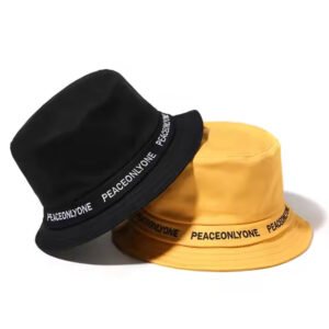Black and yellow cotton bucket hats with embroidered logo band – available for wholesale.
