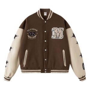 Brown varsity-style blanket and jacket with embroidered patches and leather sleeves