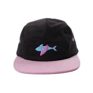 Custom five panel hat in black corduroy with pink brim and embroidered shark logo.