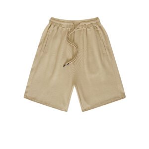 Khaki elastic waist shorts in waffle-textured poly-cotton fabric