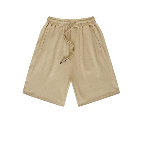 Khaki elastic waist shorts in waffle-textured poly-cotton fabric