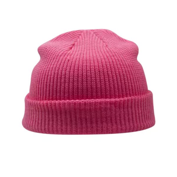 Pink acrylic knit watchcap beanie for adults, short cuffed style.