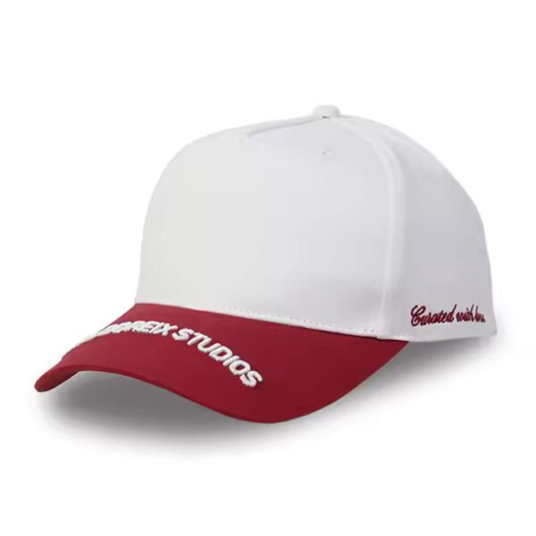 Two tone baseball cap with white crown and red curved brim featuring white embroidered logo