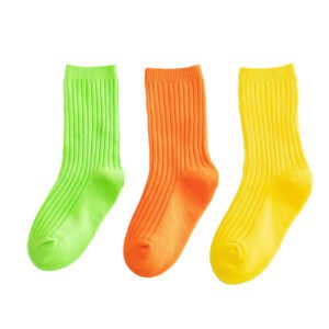 Colorful personalized tube socks for kids in green, orange, and yellow cotton.